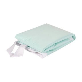 Folded light green medical patient transfer sheet with white handles on white background