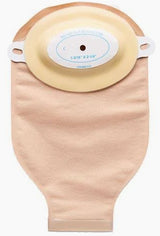 One-piece beige ostomy pouch with adhesive barrier, home medical supply on white background