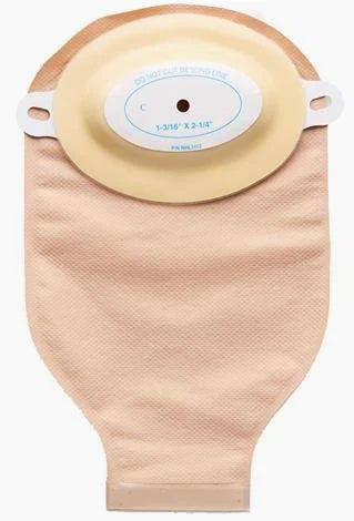 One-piece beige ostomy pouch with adhesive barrier, home medical supply on white background