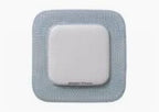 Square sterile medical wound dressing with adhesive border on white background