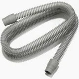 Flexible gray CPAP hose for respiratory medical equipment on white background