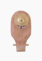 Beige ostomy bag with adhesive barrier, for medical stoma care and post-surgery use.
