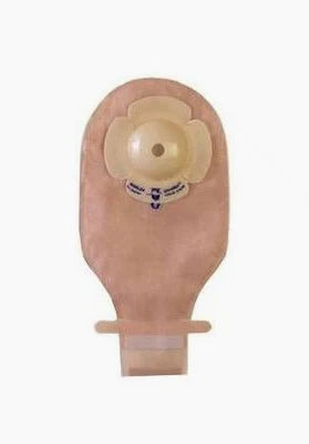 Beige ostomy bag with adhesive barrier, for medical stoma care and post-surgery use.