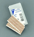 3M Steri-Strip adhesive wound closure strips with packaging on a gray background