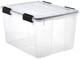 Clear plastic storage container with secure black latches and hinged lid