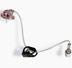 Medical infusion port with attached tubing and access port on a white background