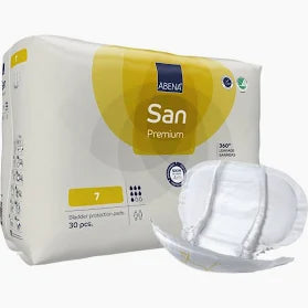 Package of Abena San Premium incontinence pads with one opened pad displayed in front