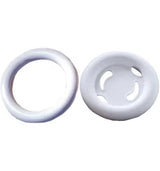 White silicone medical supply rings and disc on plain background
