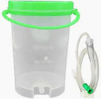 Medical suction canister with green lid and attached tubing for home healthcare supplies