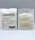 Two sealed packets of powdered medical supply on white background, front and back view