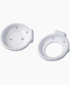 Two white plastic ostomy appliance rings for medical supply home use.