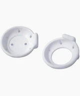 Two white plastic ostomy appliance rings for medical supply home use.