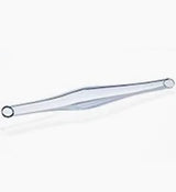 Clear plastic medical tweezer on white background, essential medical supply.