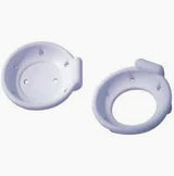 Two white plastic ostomy appliance rings for medical supply use on a plain background