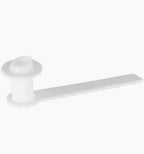 White plastic medical supply component with flat handle on plain background