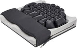 Medical air cushion seat with contoured foam and black inflatable cells for pressure relief.
