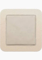 Square adhesive wound dressing pad for medical use, shown on a white background