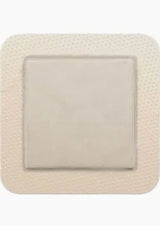 Square adhesive wound dressing pad for medical use, shown on a white background