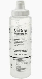 Clear plastic bottle of ultrasound gel for medical use with nozzle cap and labeled instructions.