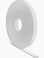 Large roll of white medical tape on a neutral background