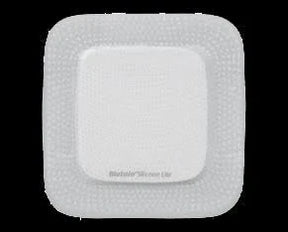 Square silicone foam medical wound dressing pad on black background