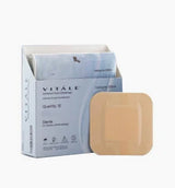 Box of adhesive wound dressings with one hydrocolloid bandage in front