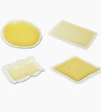 Assorted hydrocolloid wound dressings for chronic wound care on a white background