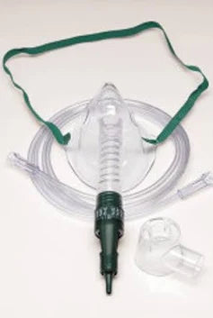 Oxygen mask with green strap and clear tubing for home medical respiratory care