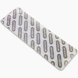 Sterile rectangular medical bandage in sealed silveranti packaging on white background