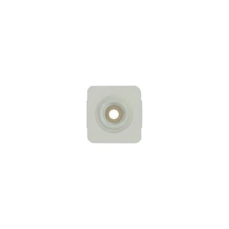 Square adhesive medical ostomy barrier with central opening on white background