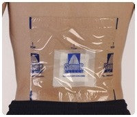 Transparent medical adhesive dressing applied to lower back over gauze pad