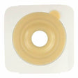 Hydrocolloid ostomy barrier with adhesive backing for secure skin protection