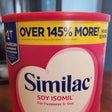 Similac Soy Isomil infant formula container for fussiness and gas, over 145% more powder label.