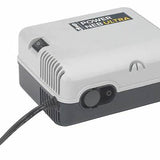 Compact tabletop medical nebulizer machine with labeled Power Neb Ultra cover