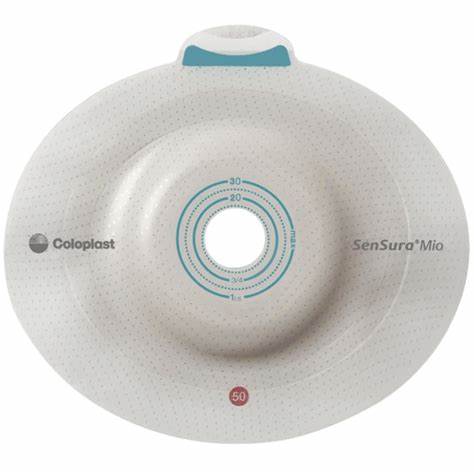 Circular medical ostomy barrier with central stoma opening and measuring guides, labeled SenSura Mio.