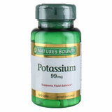 Nature's Bounty Potassium 99mg supplement bottle with green cap and white label