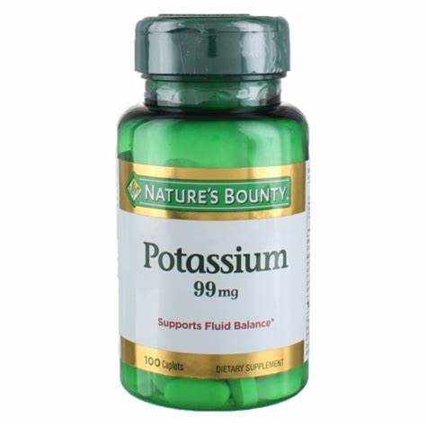 Nature's Bounty Potassium 99mg supplement bottle with green cap and white label