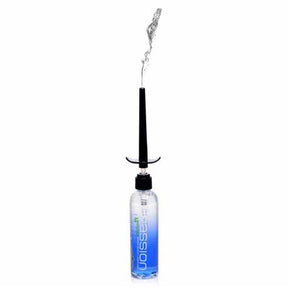 Nasal irrigation bottle with black nozzle spraying water, used for sinus and allergy relief