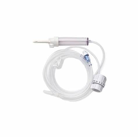 Clear medical IV administration set with tubing and flow regulator on white background