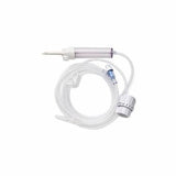 Clear medical IV administration set with tubing and flow regulator on white background