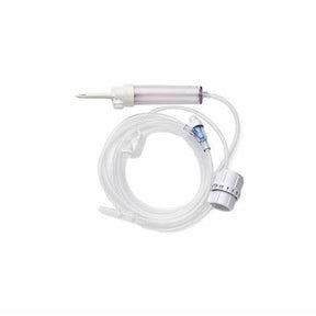 Clear medical IV administration set with tubing and flow regulator on white background