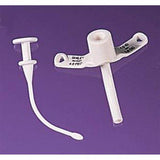 Medical tracheostomy tube with obturator on a purple background, essential for airway care