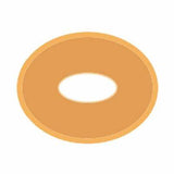 beige medical adhesive barrier ring with central hole, ostomy supplies on white background