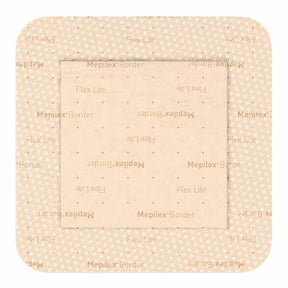 Square beige medical wound dressing with adhesive border and printed label text.