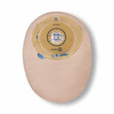 Beige ostomy bag with circular flange and filter, essential medical supply for stoma care