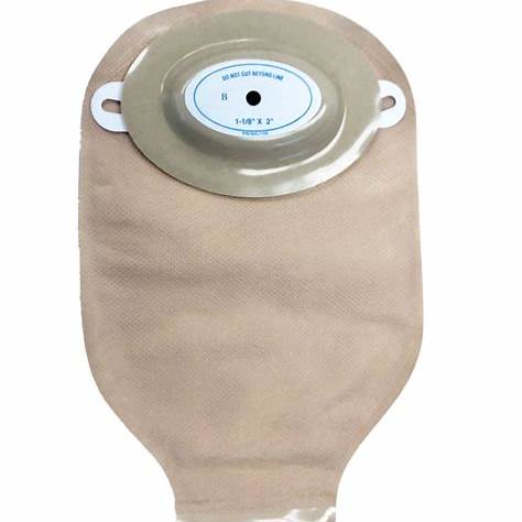 Beige ostomy pouch with adhesive barrier for medical stoma care, home medical supply