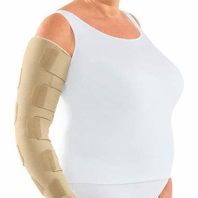 Woman wearing a beige medical compression sleeve on arm for lymphedema support