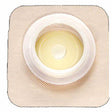 ostomy barrier with adhesive border for stoma care on a white background