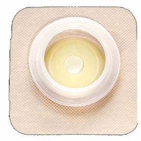 ostomy barrier with adhesive border for stoma care on a white background