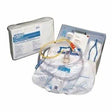 Sterile catheterization kit with tubing, drainage bag, and medical accessories for home use
